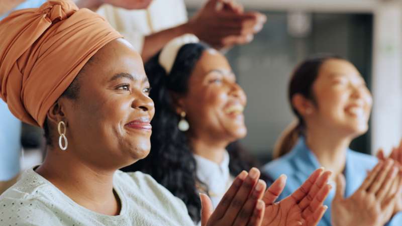 black women clapping