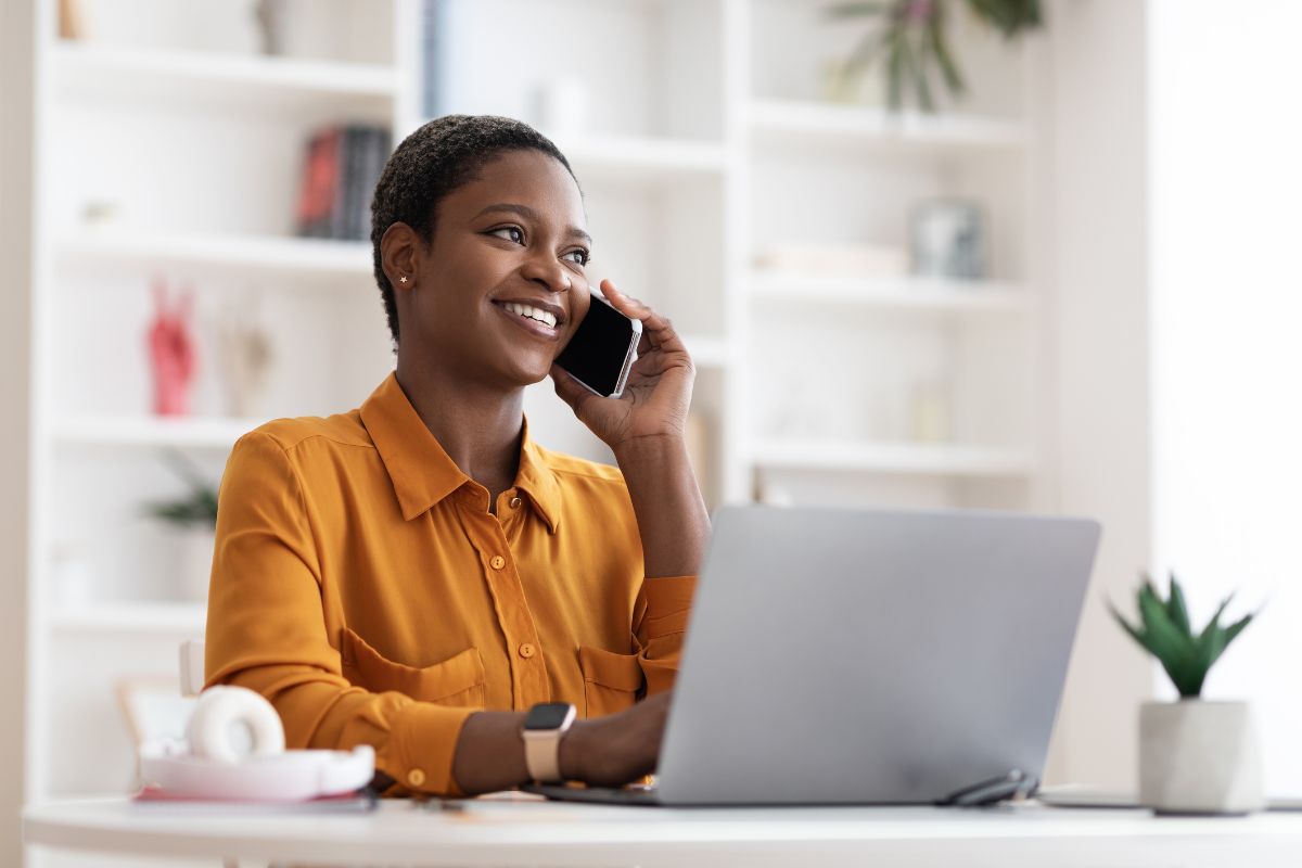 woman on phone and computer