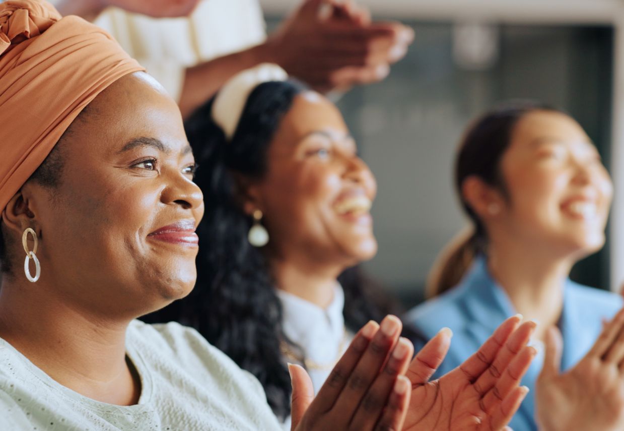 women applauding