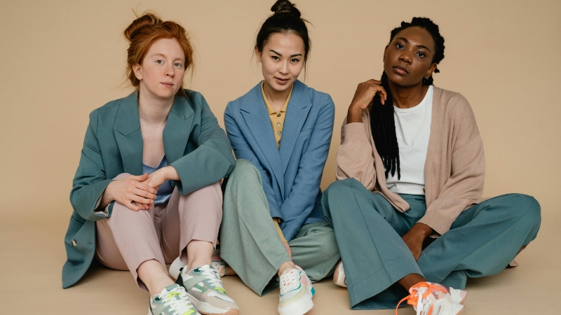 Three women sitting on the floor